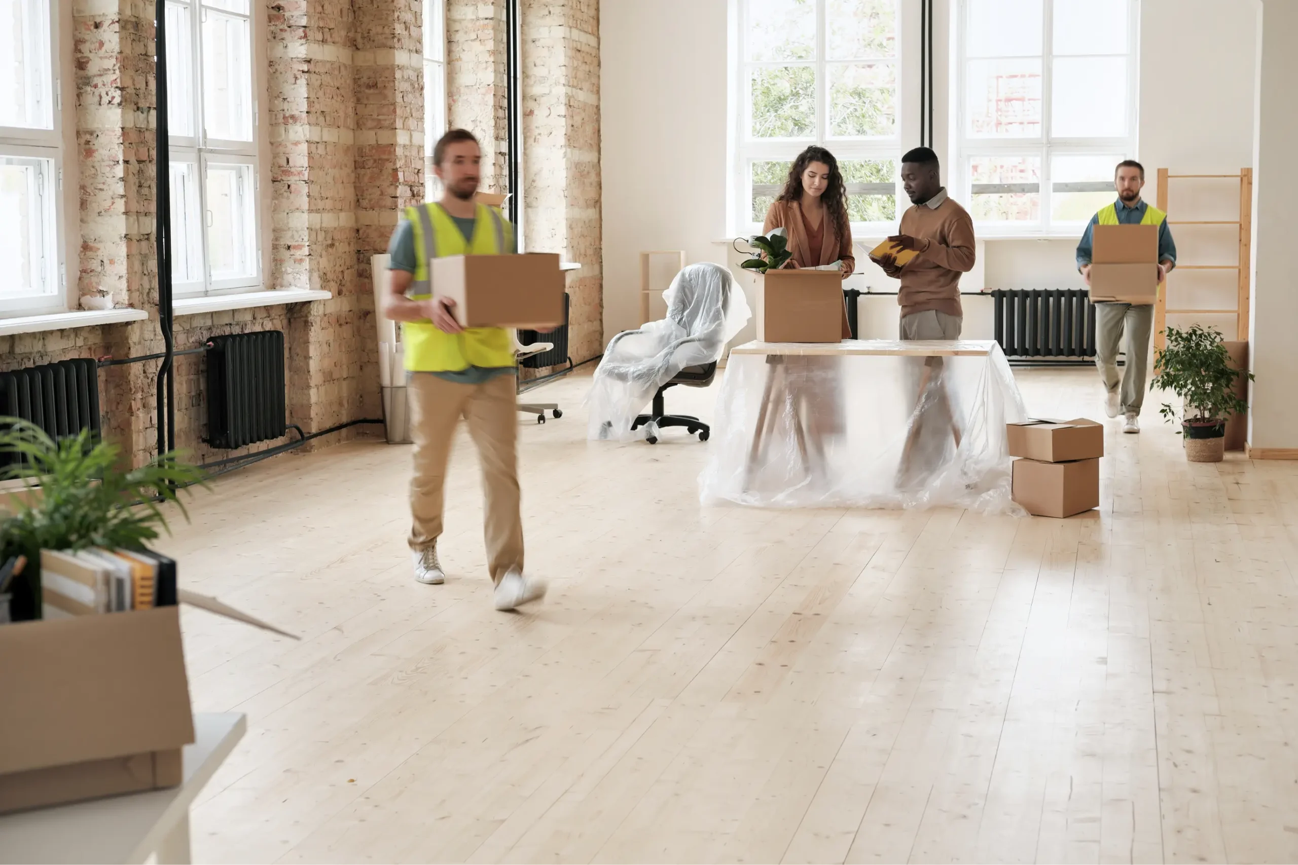 loaders-office-employees-setting-up-new-space